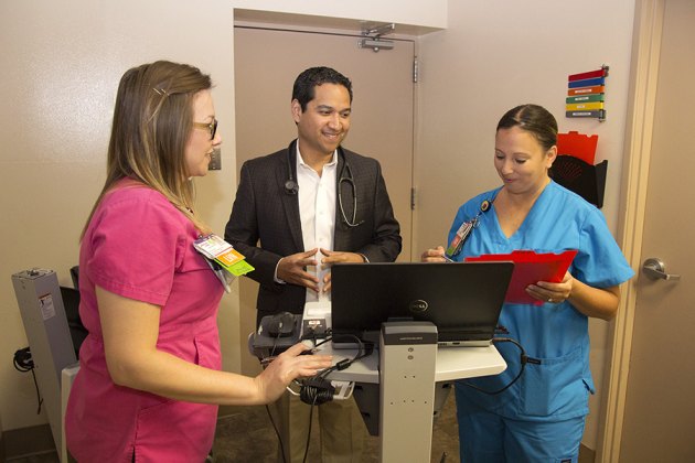 Keisha Magana-Aiken, Dr. Raul Ayala and Lisa Chavarin are part of a team caring for complex chronic care patients.